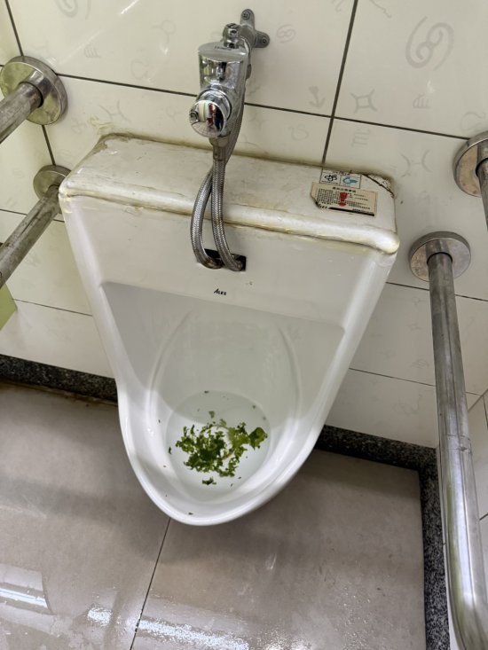 廁所小便斗堵塞